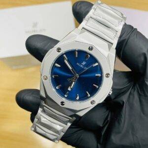 Home ساعة رجالية تصميم هندسي معدني بمينا أزرق داكن وسوار ستانلس ستيل.